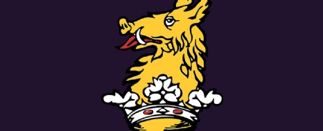 The school's emblem (a boar's head and a crown)